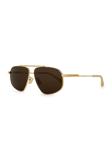 Shop Bottega Veneta Metal Caravan Sunglasses In Shiny Gold
