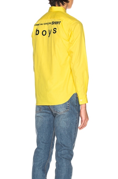 yellow cdg shirt