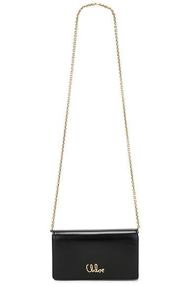 Valentino Garavani Mini V Logo Drawstring Bag in Lilac Ash