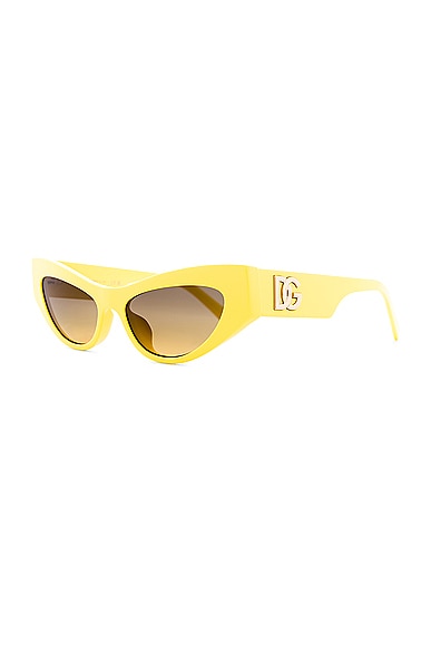 Shop Dolce & Gabbana Cat Eye Sunglasses In Yellow