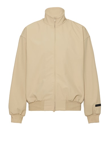 Fear of God ESSENTIALS Bonded Nylon Bomber Jacket in Desert Sand