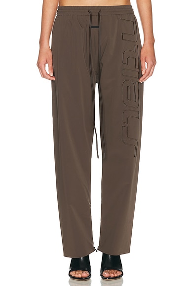 Fear of God ESSENTIALS Active Trace Track Sporty Nylon Pant in Brown