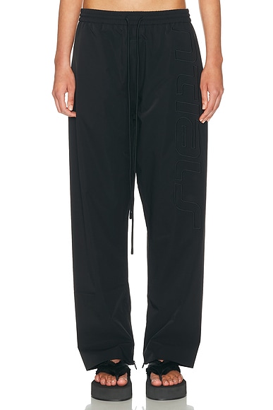 Fear of God ESSENTIALS Active Trace Track Sporty Nylon Pant in Vintage Black