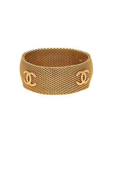 FWRD Renew Chanel Coco Mark Bangle Bracelet in Gold