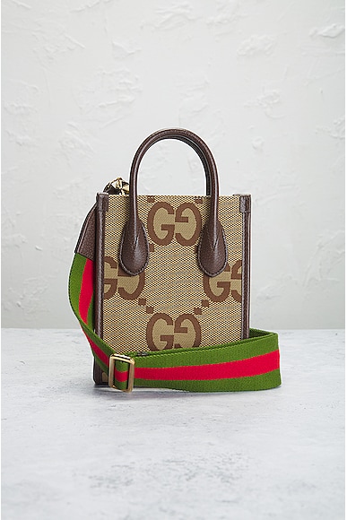 Shop Gucci Gg Jumbo 2 Way Handbag In Brown