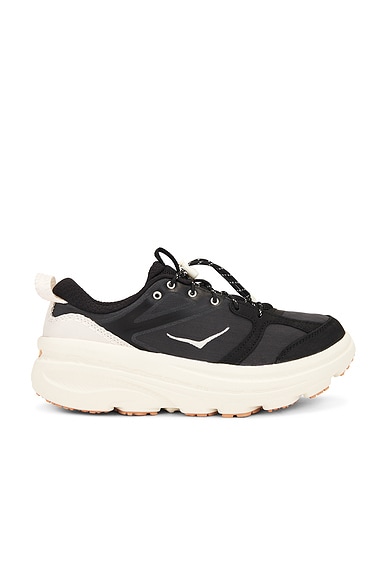 Common Projects Four Hole in Leather Low Sneaker in Black White FWRD