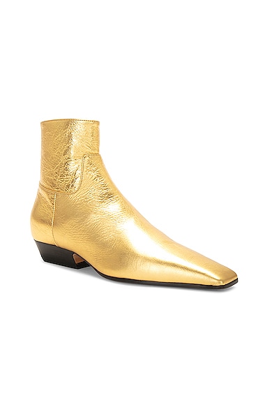 Shop Khaite Marfa Classic Flat Ankle Boot In Gold