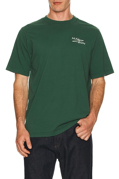 Malbon Golf Bermuda Sport Utility Tee in Hunter Green