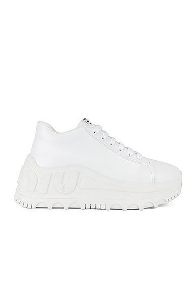 Click to view more detailed imagery on our partner's website Miu Miu Logo-Embossed Leather Trainers In White