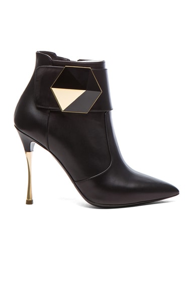 leather boots with geometric sole