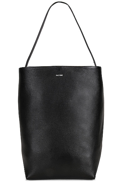 The Row Large N/S Park Tote in Black PLD | FWRD