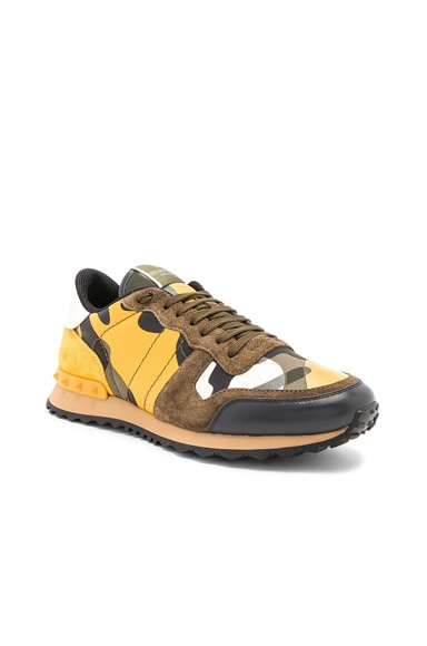 Valentino Garavani Rockstud Camouflage Sneakers in Yellow Multi FWRD