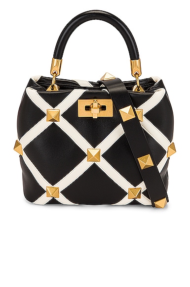 Valentino Garavani Small Roman Stud Top Handle Bag in Nero & Ivory | FWRD