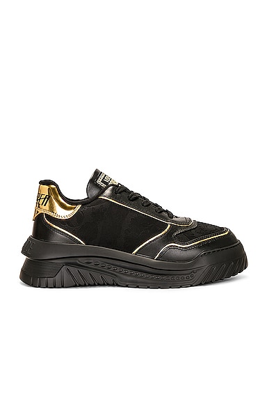 Shop Versace Low Top Sneaker In Black & Gold