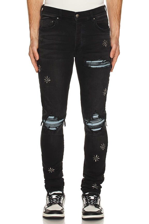 Amiri MX1 Leather Patch Skinny Jeans in Aged Black | FWRD