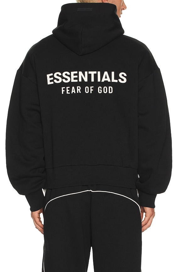 Fear of God ESSENTIALS Classic Fit Fleece Hoodie in Jet Black | FWRD