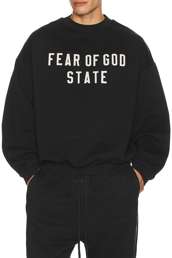 Fear of God ESSENTIALS Classic Fit Fleece Hoodie in Jet Black | FWRD