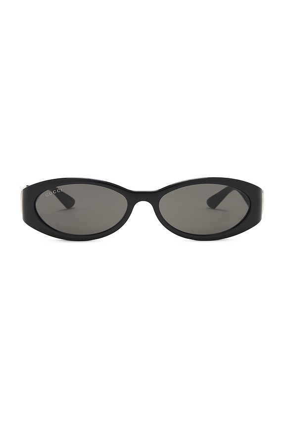 Saint Laurent Oval Sunglasses in Black | FWRD