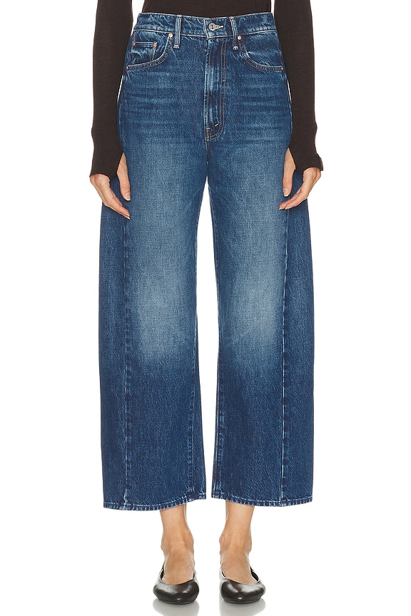 Toteme Boot Leg Jeans in Mid Blue | FWRD