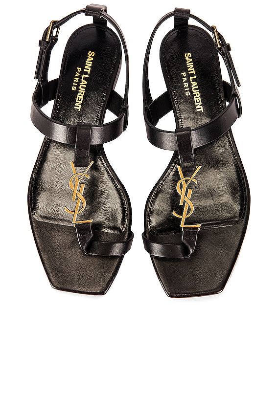 Saint Laurent Cassandra Leather Flat Sandals in Nero | FWRD