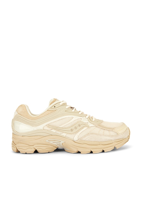 Maison Margiela Replica Low Top Sneakers in Nude | FWRD