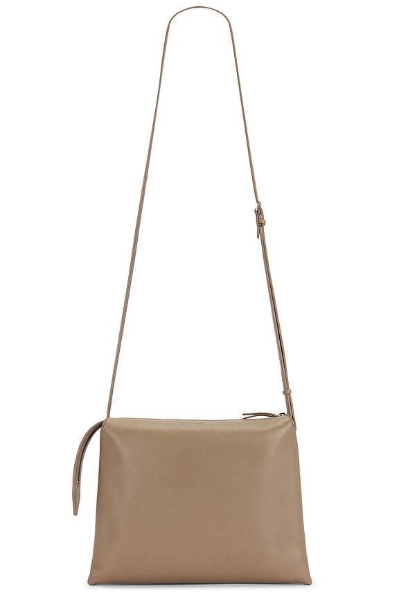 The Row 90s Bag in Ivory PLD | FWRD
