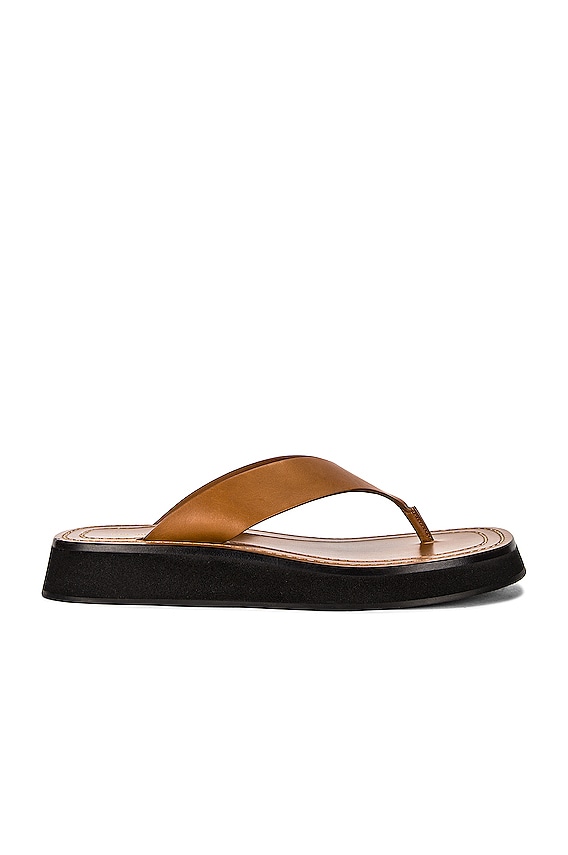 The Row Ginza Thong Sandals in Natural & Black | FWRD