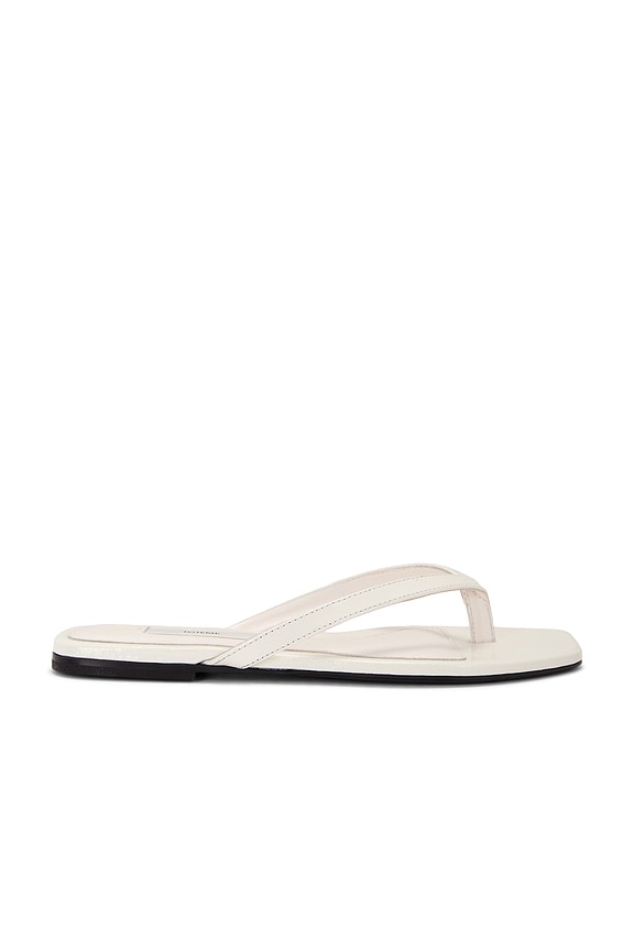 The Row Constance Leather Flat Sandals in Bianco | FWRD