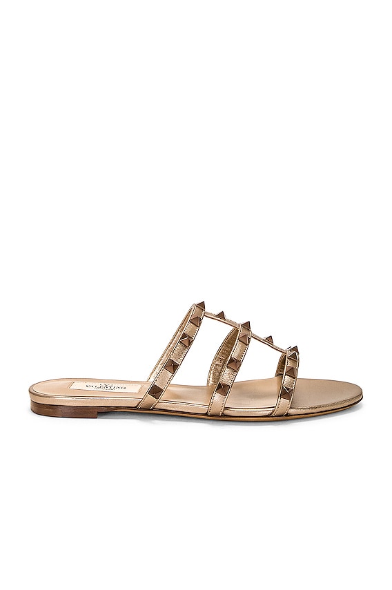 Valentino Garavani Rockstud Sandals in Star Gold | FWRD