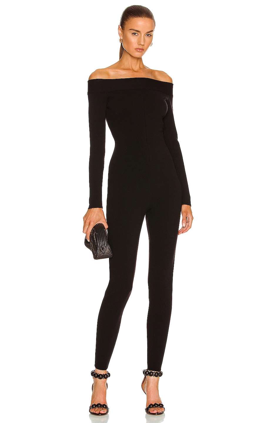 Image 1 of ALAÏA Off the Shoulder Slim Fit Jumpsuit in Noir