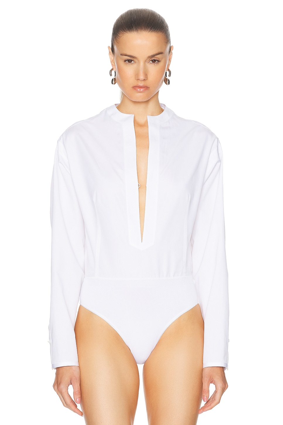 Shop Alaïa Long Sleeve Bodysuit In Blanc