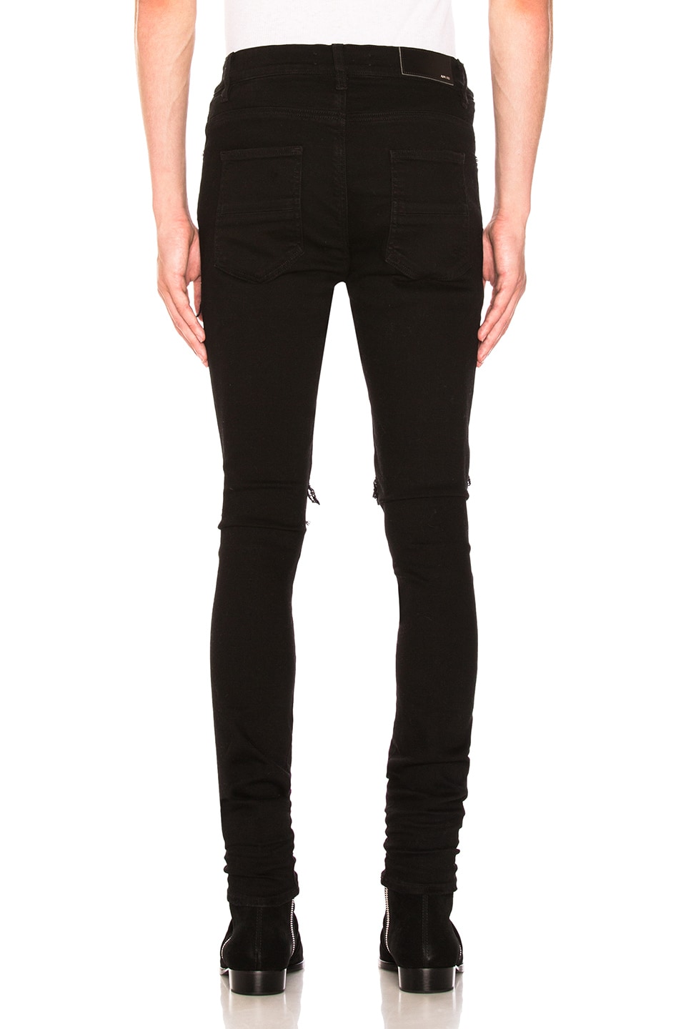 Amiri MX1 Leather Patch Skinny Jeans in Black | FWRD