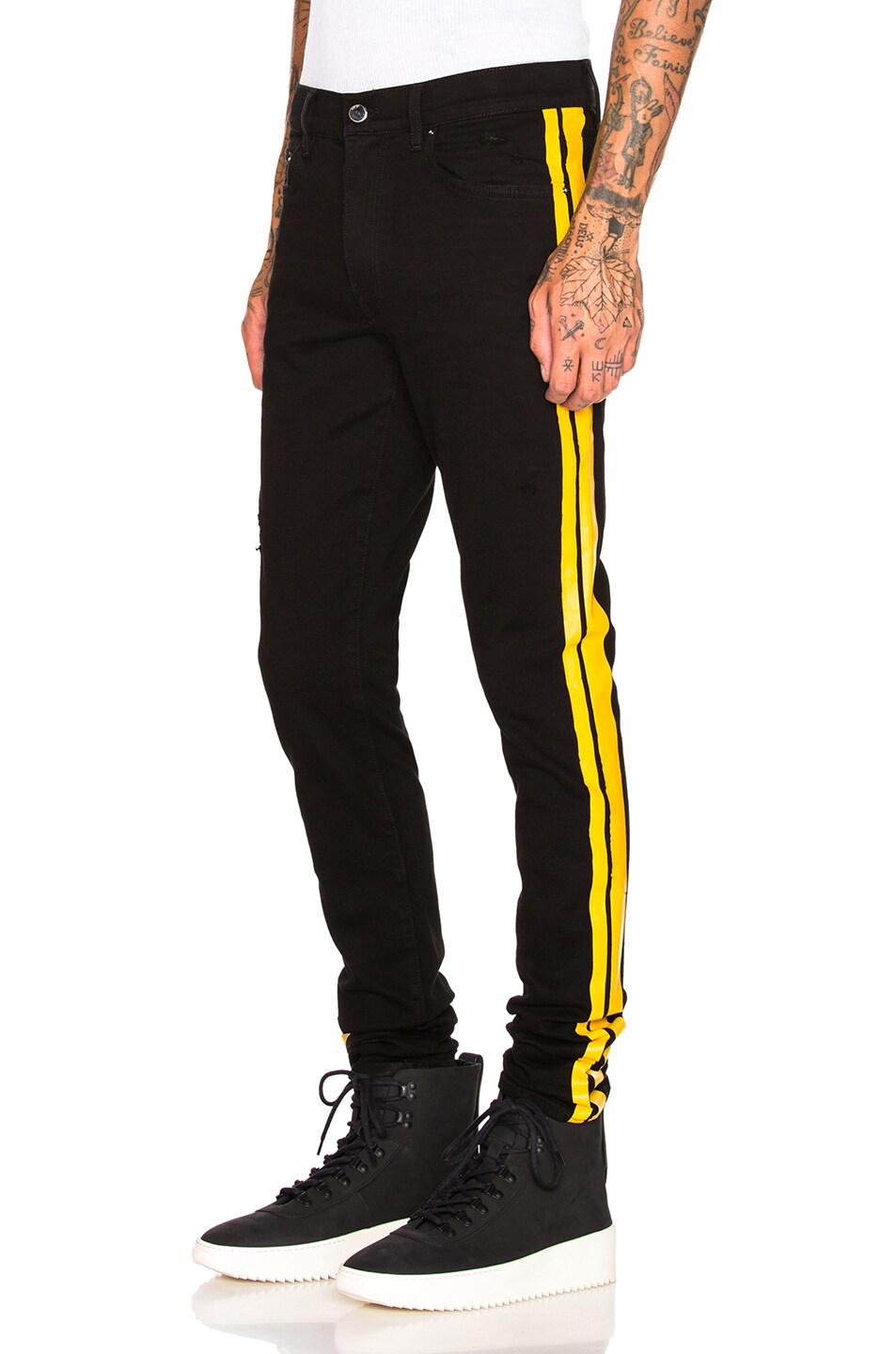 Image 1 of Amiri Stack Track Jean in Black & Yellow