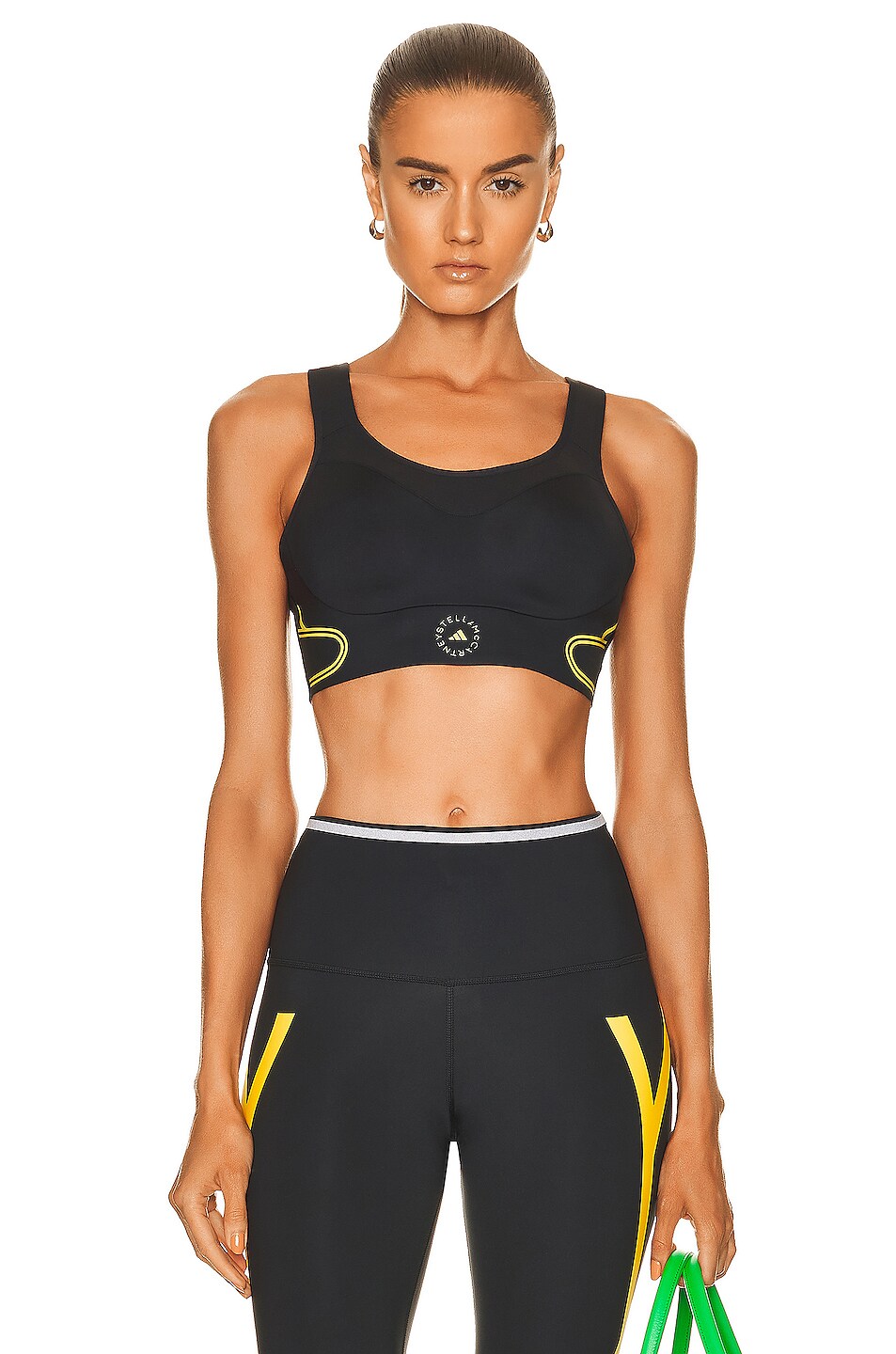 Image 1 of adidas by Stella McCartney True Pace High Support Sports Bra in Black & Shock Yellow