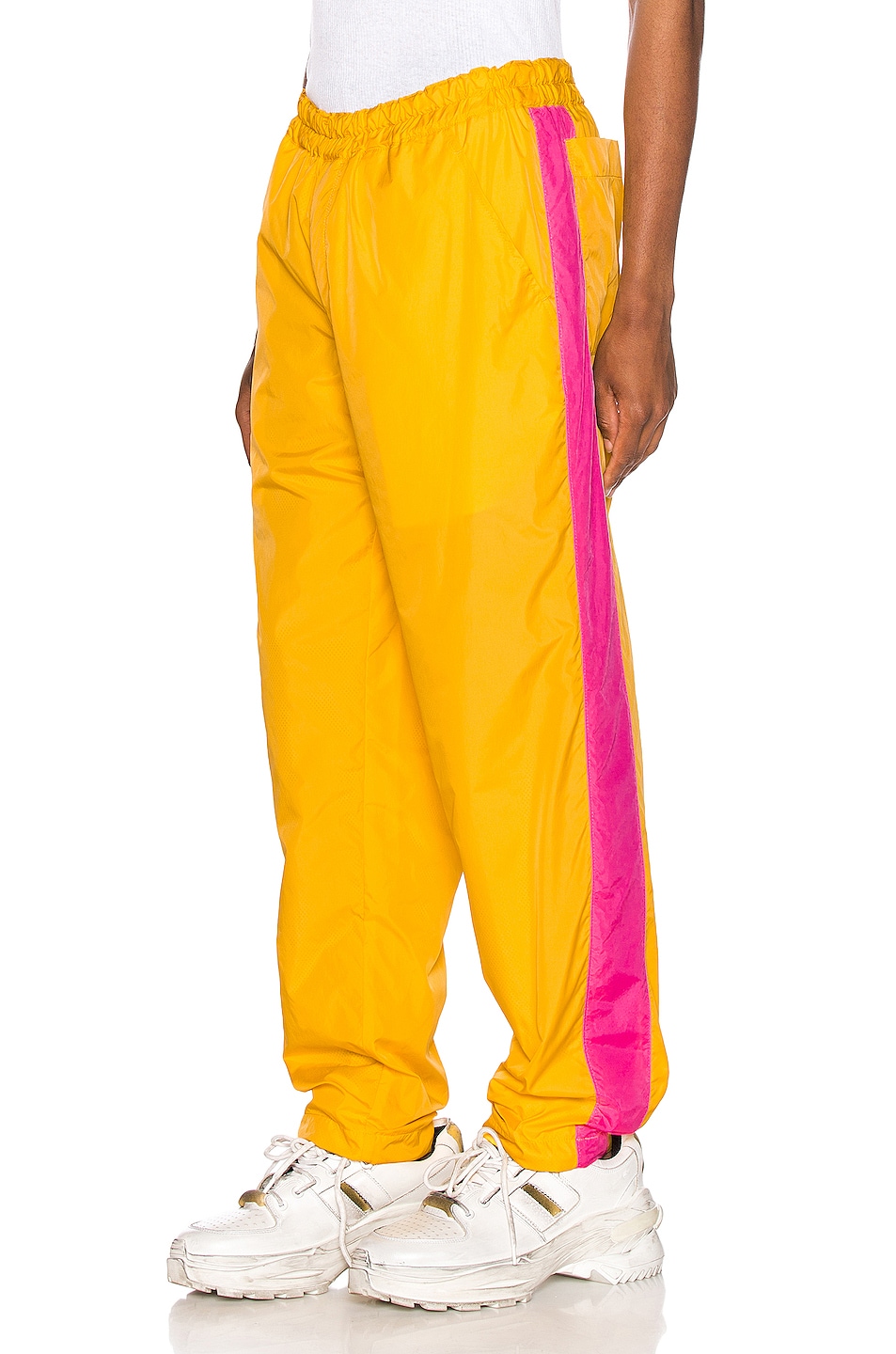 Image 1 of COMME des GARCONS SHIRT Mesh Pants in Yellow & Pink
