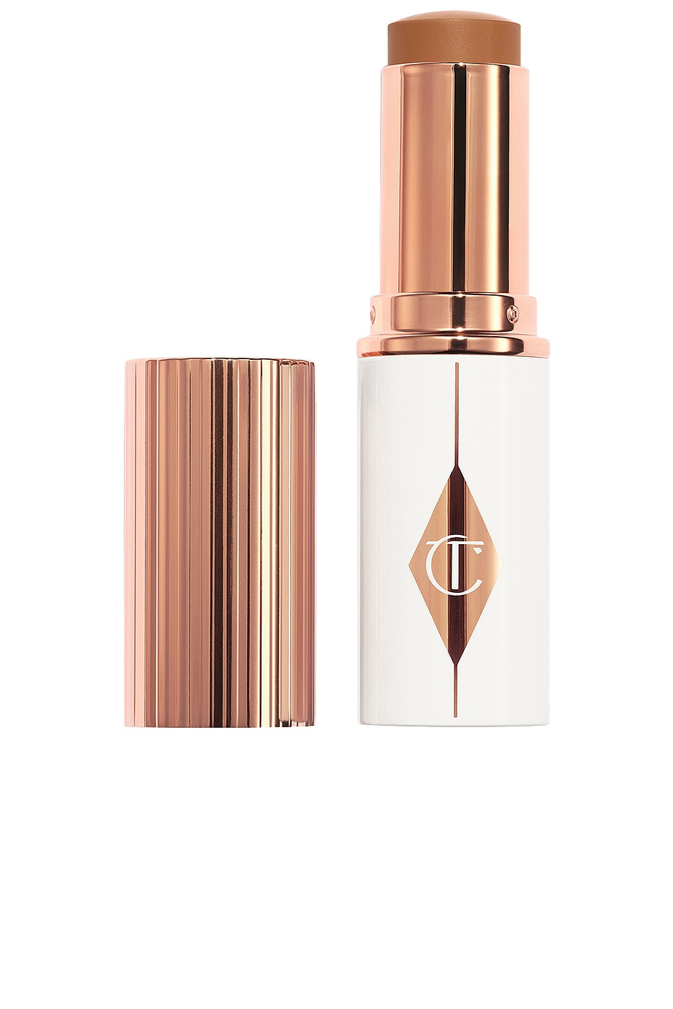 Shop Charlotte Tilbury Unreal Skin Sheer Glow Tint Hydrating Foundation Stick In 12.5 Tan