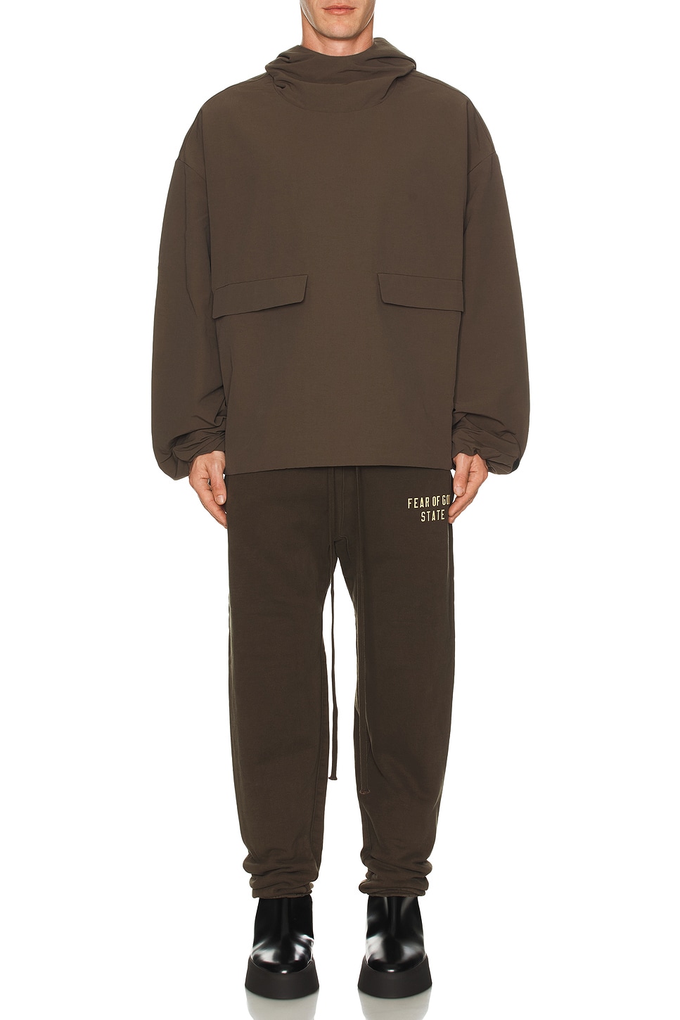Image 1 of Fear of God ESSENTIALS Military Nylon Hooded Anorak in Brown