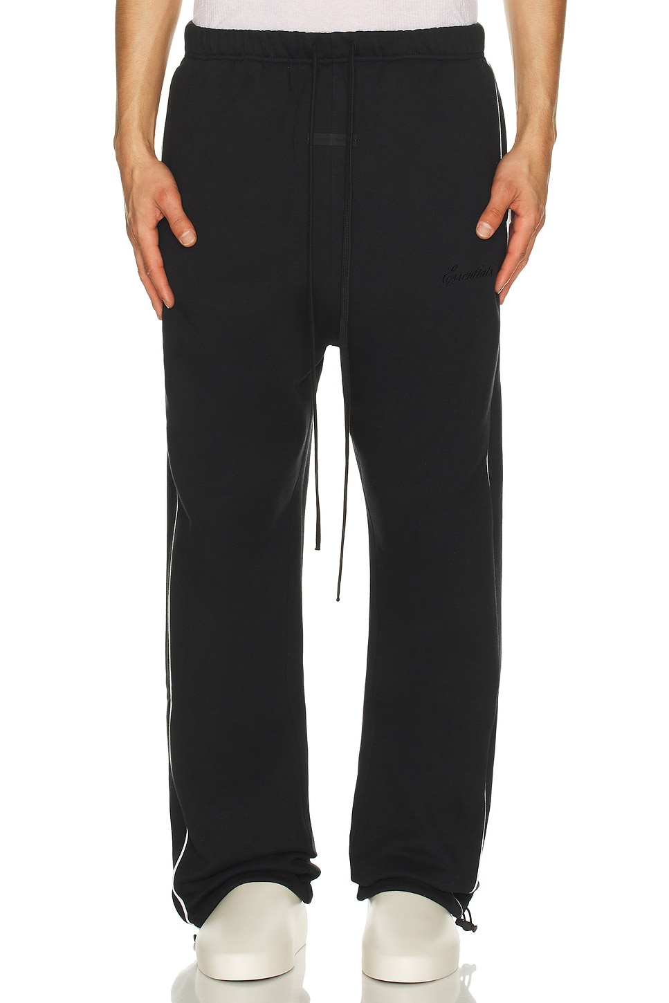 Image 4 of Fear of God ESSENTIALS Sporty Nylon Relaxed Sweatpant With Piping in Jet Black & Cloud White