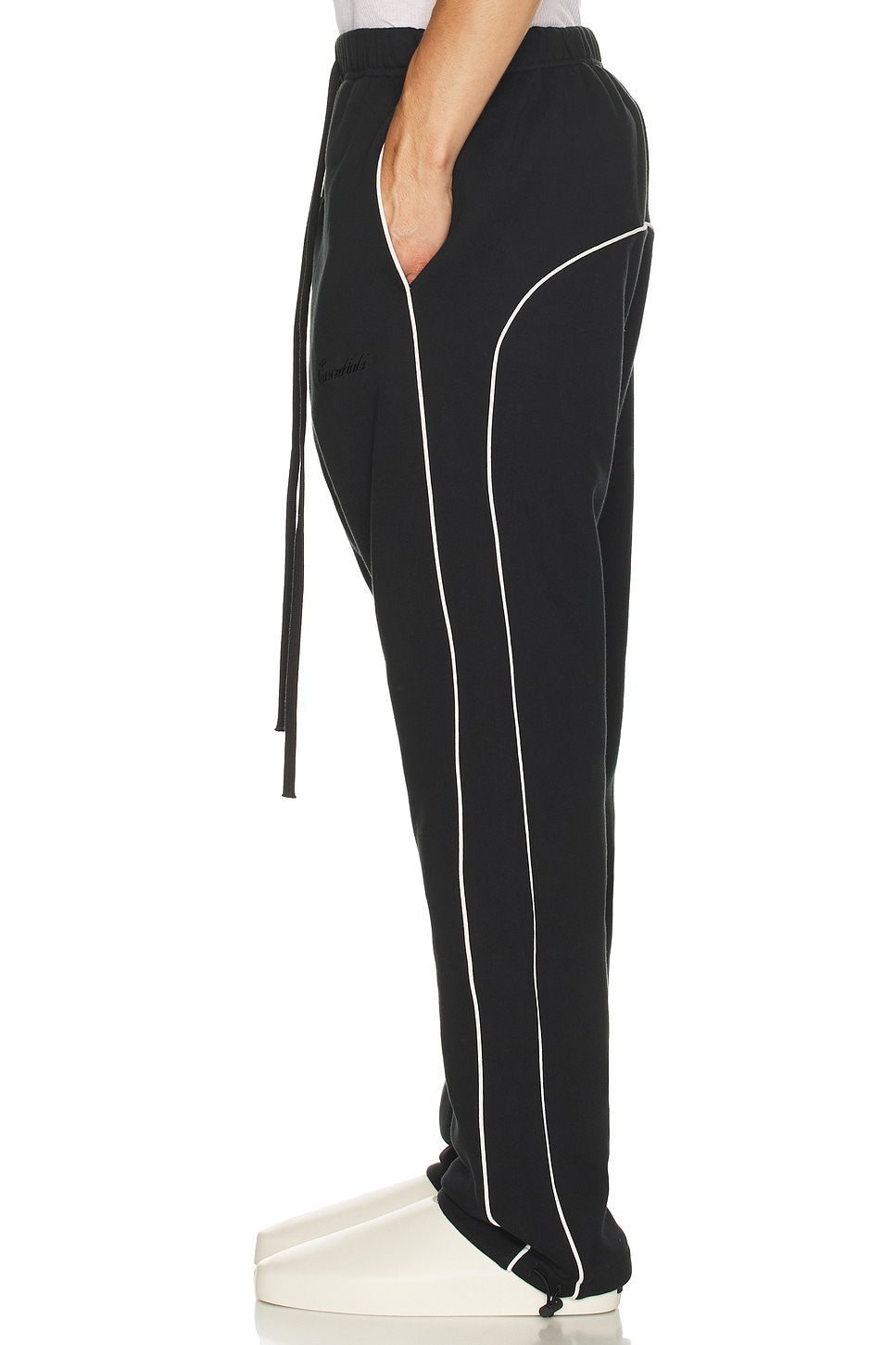 Image 5 of Fear of God ESSENTIALS Sporty Nylon Relaxed Sweatpant With Piping in Jet Black & Cloud White