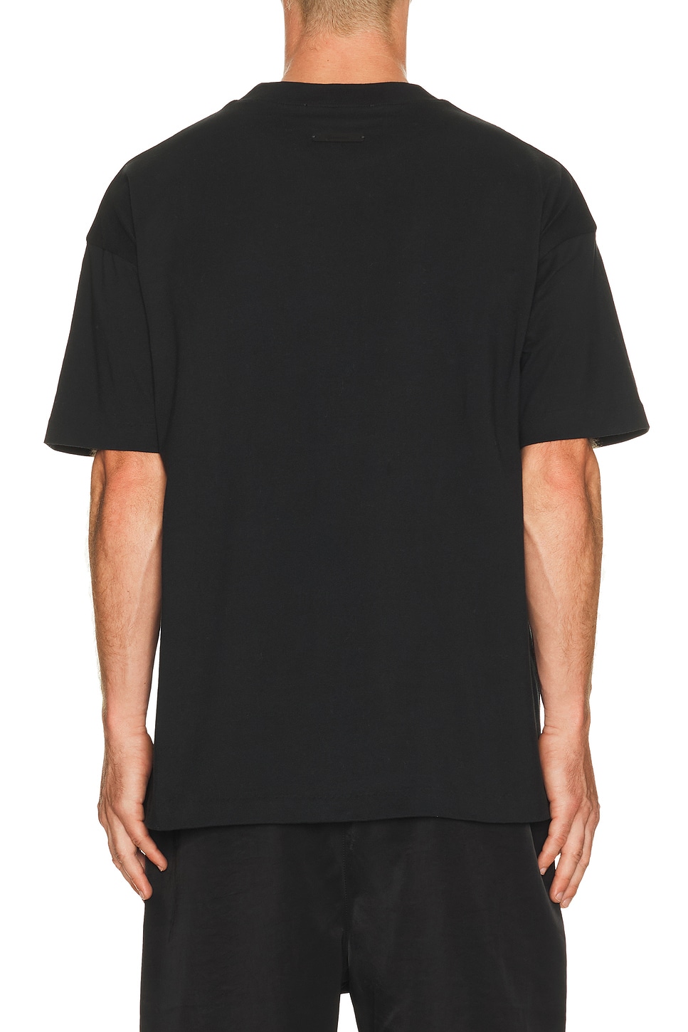Fear of God ESSENTIALS Classic Short Sleeve Tee in Vintage Black | FWRD