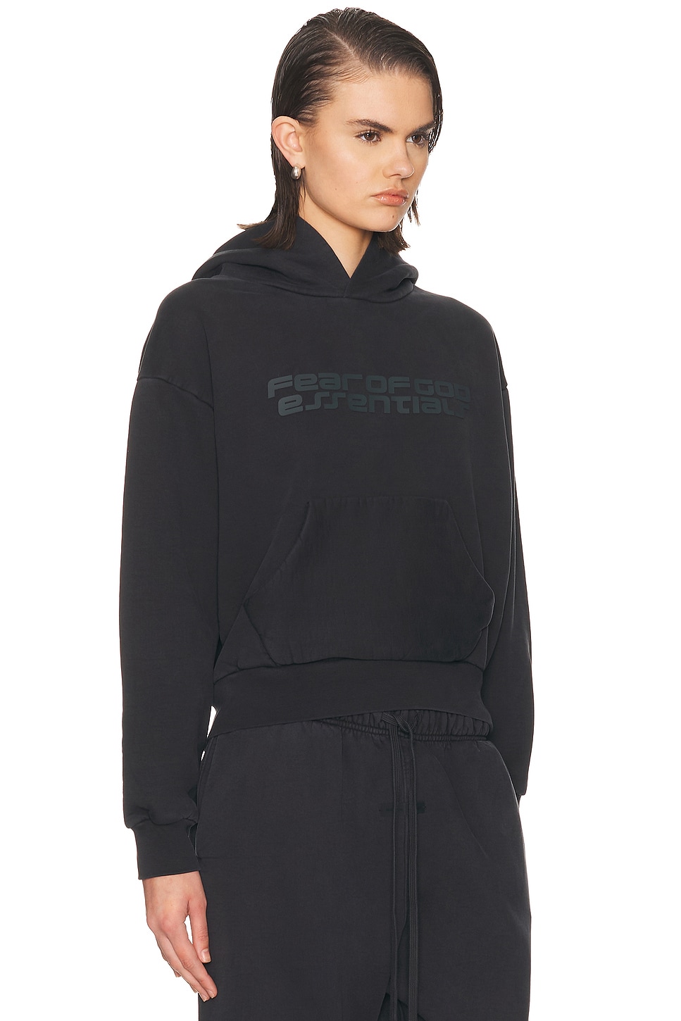 Fear of God ESSENTIALS Classic Hoodie in Vintage Black | FWRD