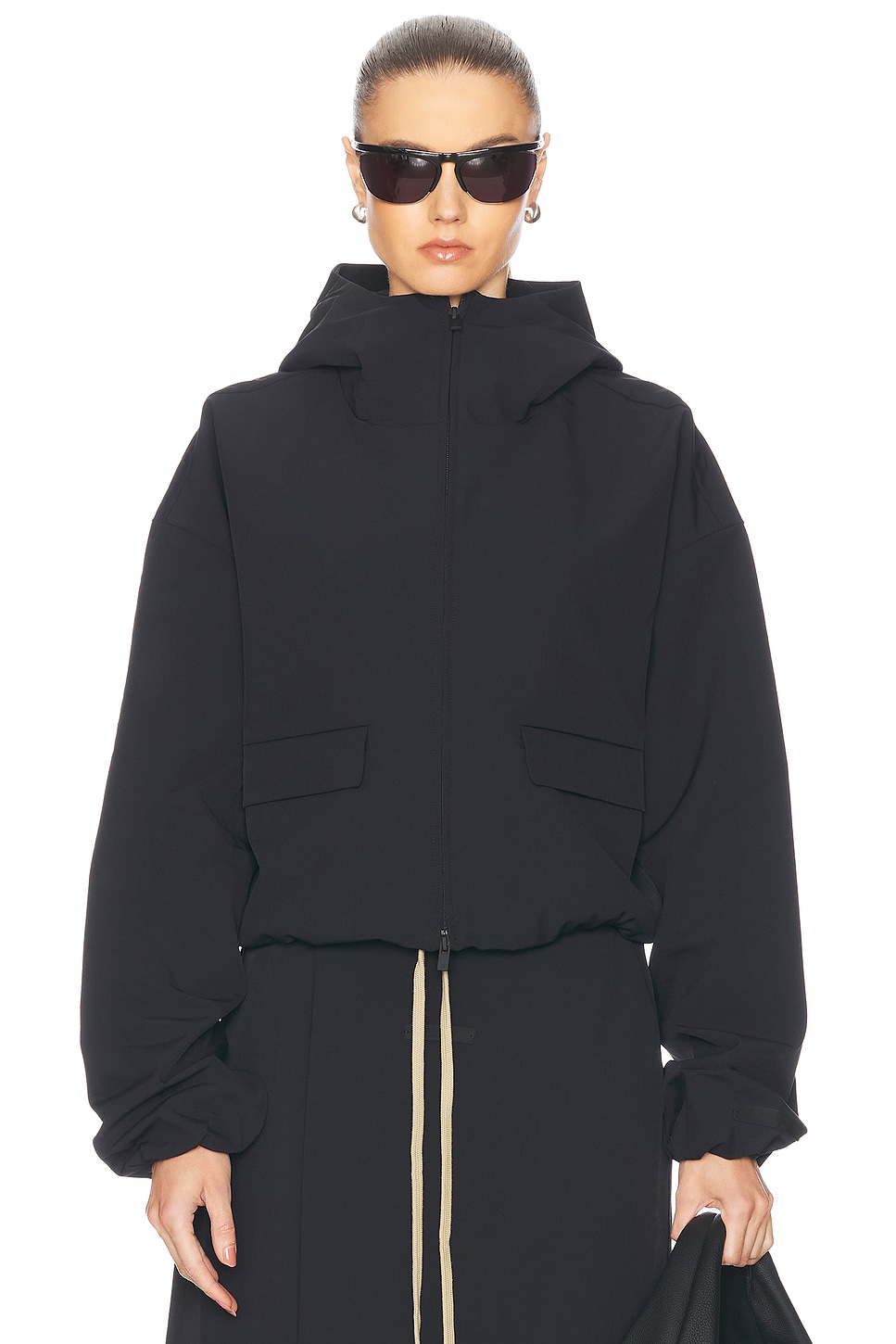 Image 1 of Fear of God ESSENTIALS Hooded Anorak in Black