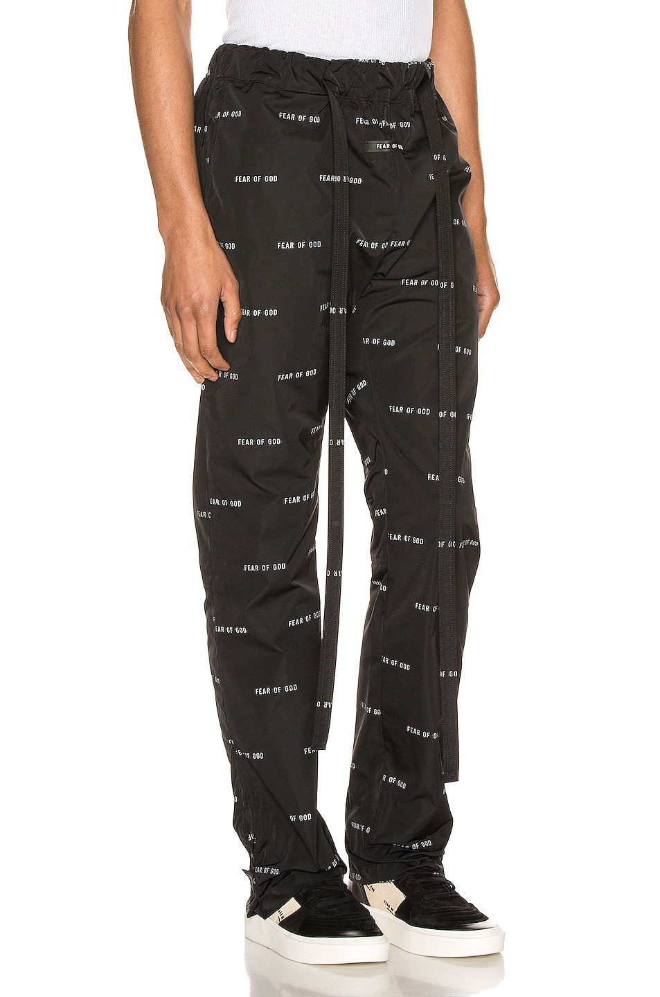 Fear of God All Over Print Baggy Nylon Pant in Black | FWRD