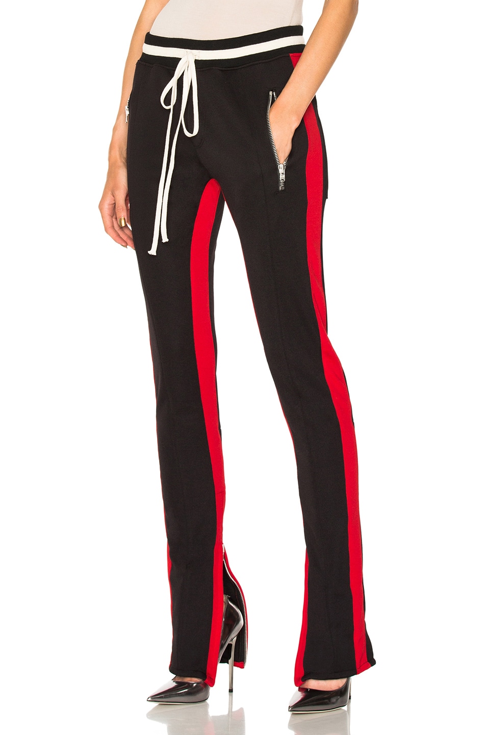 red track pants white stripe