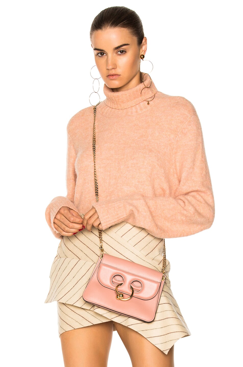 Image 1 of FRAME Denim Slouchy Turtleneck Sweater in Dusty Pink