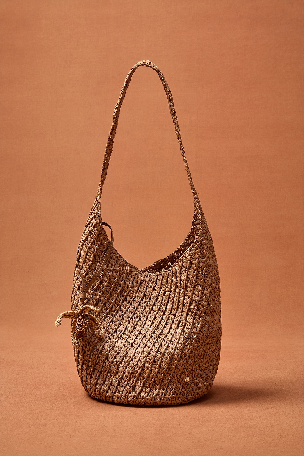 Helen Kaminski for FWRD Lani Raffia Crochet Bucket Bag With Palm Tree Charm | Thumbnail 5 Helen Kaminski for FWRD Lani Raffia Crochet Bucket Bag With Palm Tree Charm | Thumbnail 5