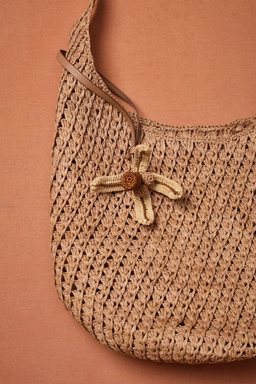 Helen Kaminski for FWRD Lani Raffia Crochet Bucket Bag With Palm Tree Charm | Thumbnail 6 Helen Kaminski for FWRD Lani Raffia Crochet Bucket Bag With Palm Tree Charm | Thumbnail 6
