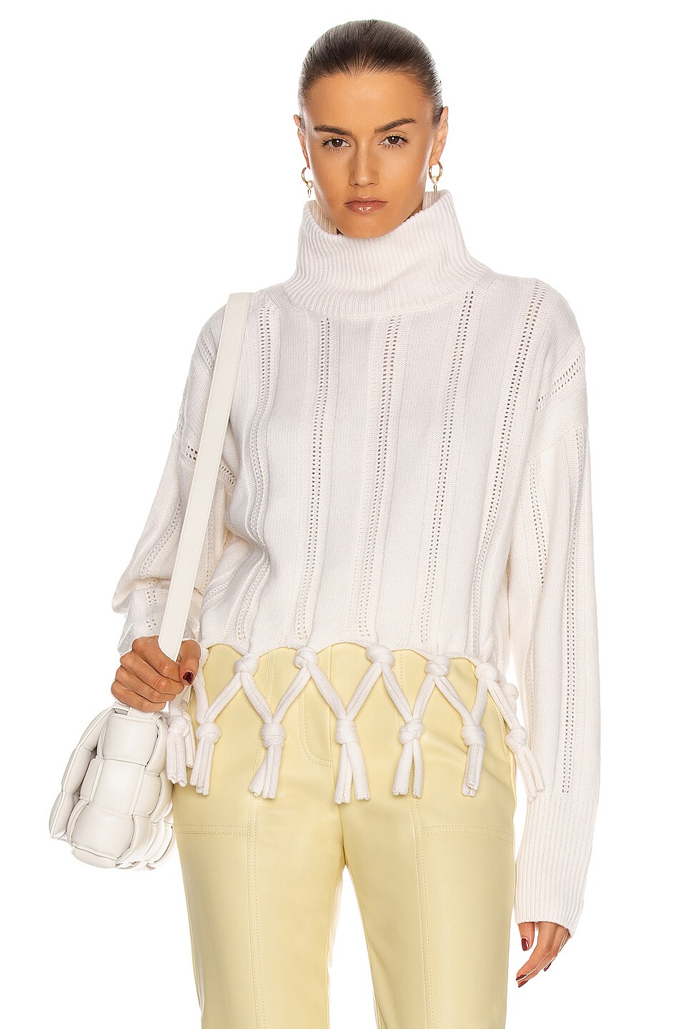 Image 1 of SIMKHAI Josephine Tassel Turtleneck Sweater in Ivory