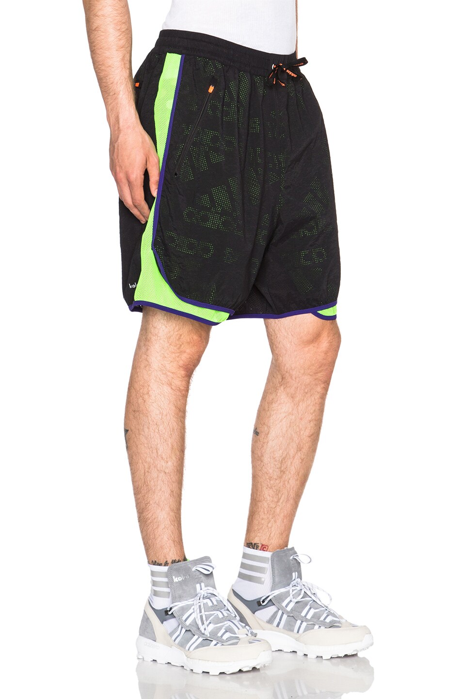 black and green adidas shorts