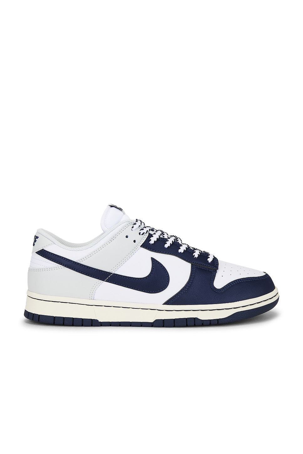 Image 1 of Nike Dunk Low Retro in White, Midnight Navy, & Photon Dust